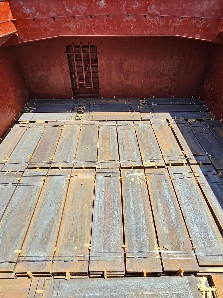Steel slabs stowed with dunnage in a cargo hold